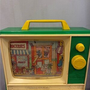 Vintage Fisher-Price Sesame Street Scrolling TV Music Box